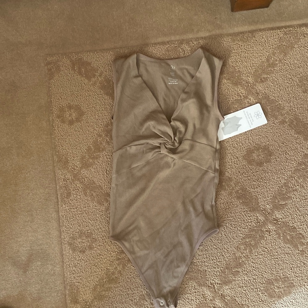Aura new with tag bodysuit.